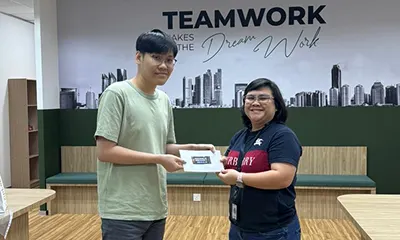 RMAICT staff receiving award of the childhood memory game