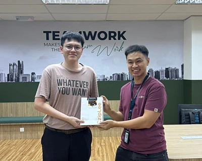 RMAICT staff receiving award of the childhood memory game