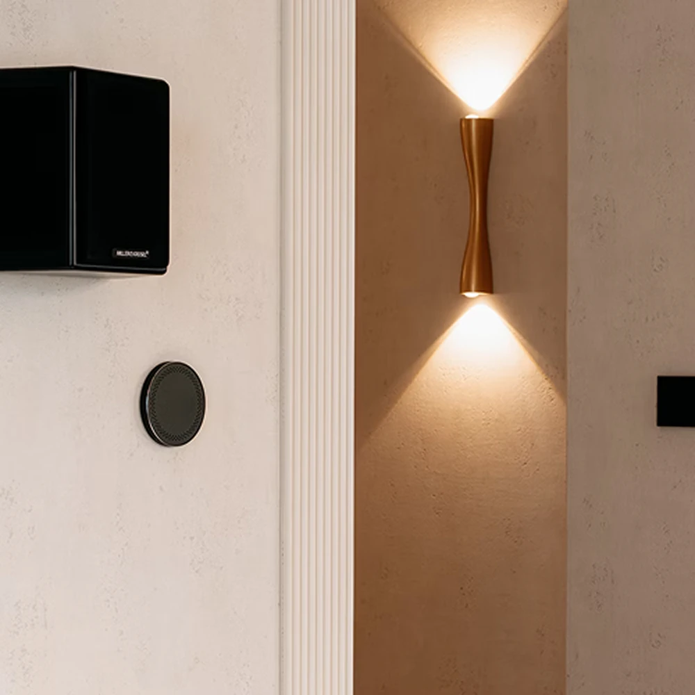 Modern interior with wall-mounted lighting and smart control devices