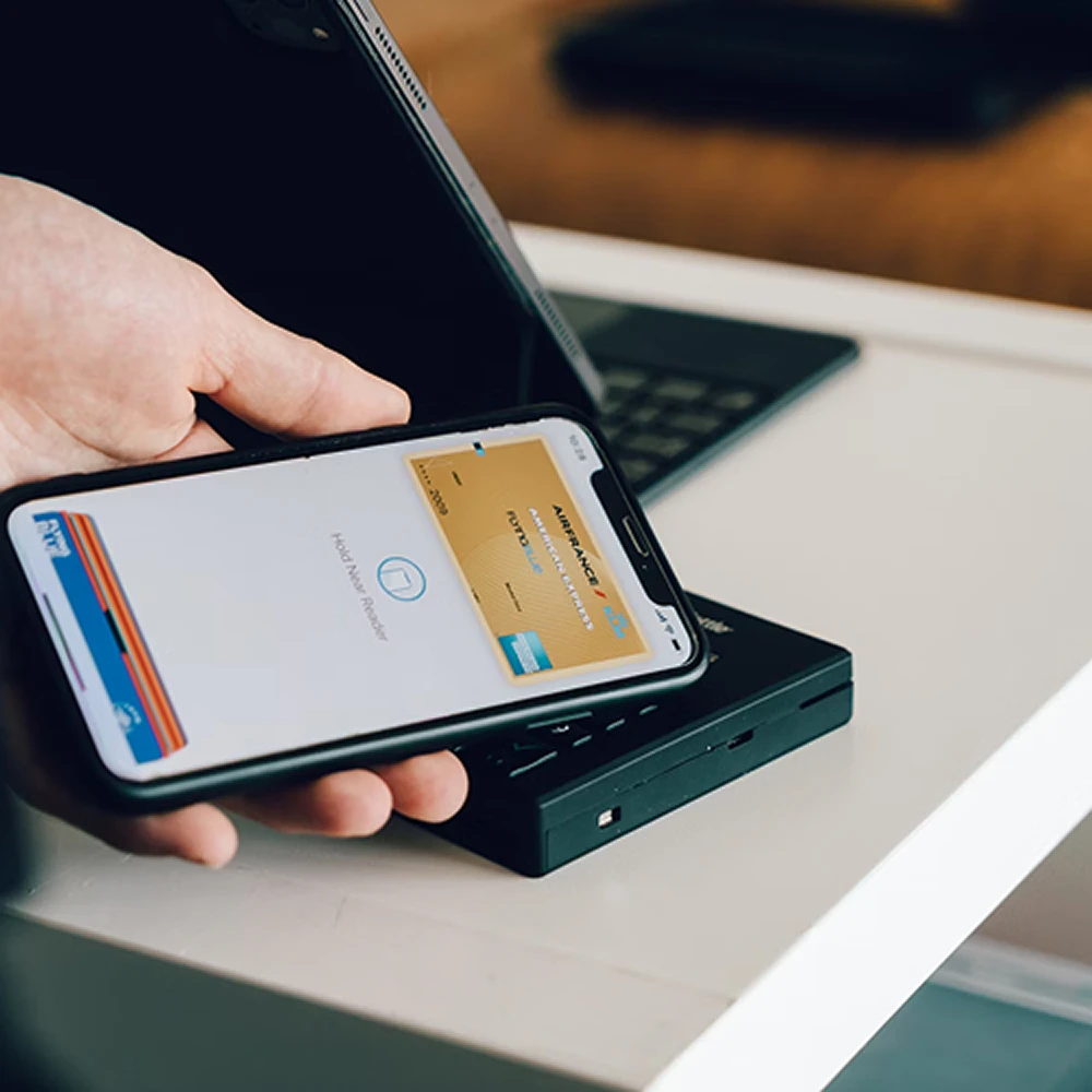 Customer making a digital payment using a point-of-sale terminal